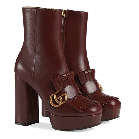 gucci leather platform ankle boots|Gucci monogram boots price.